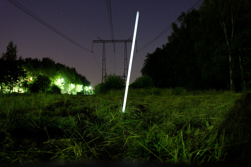 Lamp glowing under power line